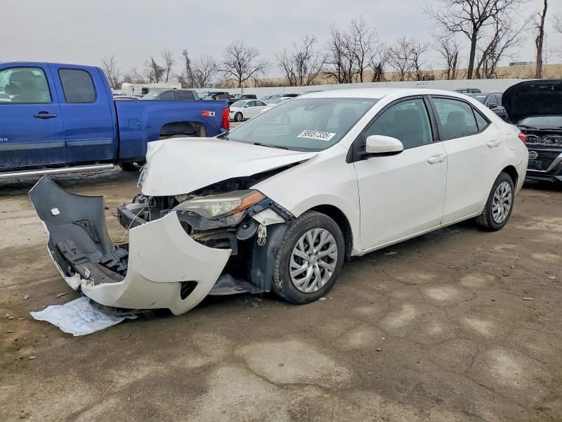 TOYOTA COROLLA L 2018 with VIN 5YFBURHE8JP827267 - Photo from auction