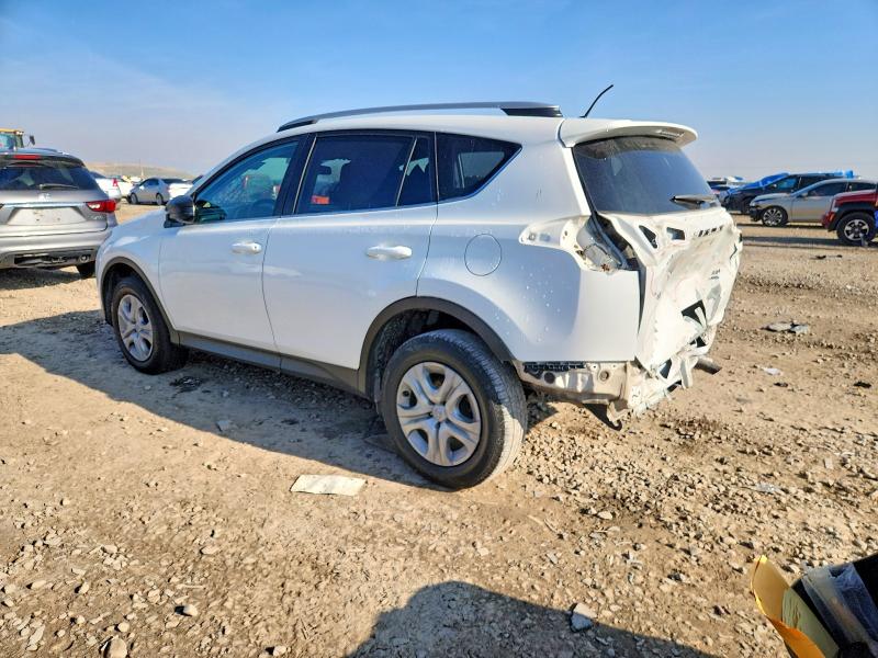 Photo 2 from auction – 2014 TOYOTA RAV4 LE with VIN 2T3BFREV2EW147309