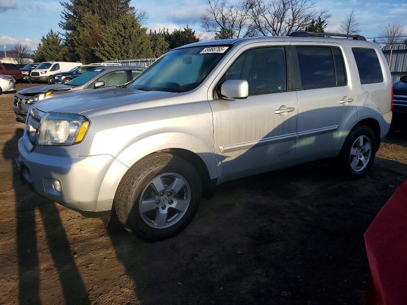 HONDA PILOT EXL 2011 with VIN 5FNYF4H56BB020962 - Photo from auction