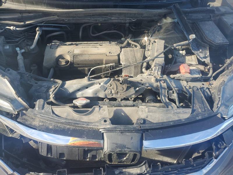 Photo 11 from auction – 2015 HONDA CR-V LX with VIN 2HKRM4H30FH604211