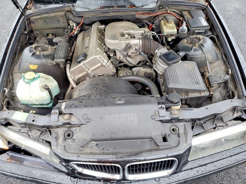 Photo 11 from auction – 1994 BMW 318 IC with VIN WBABK5329REC83155