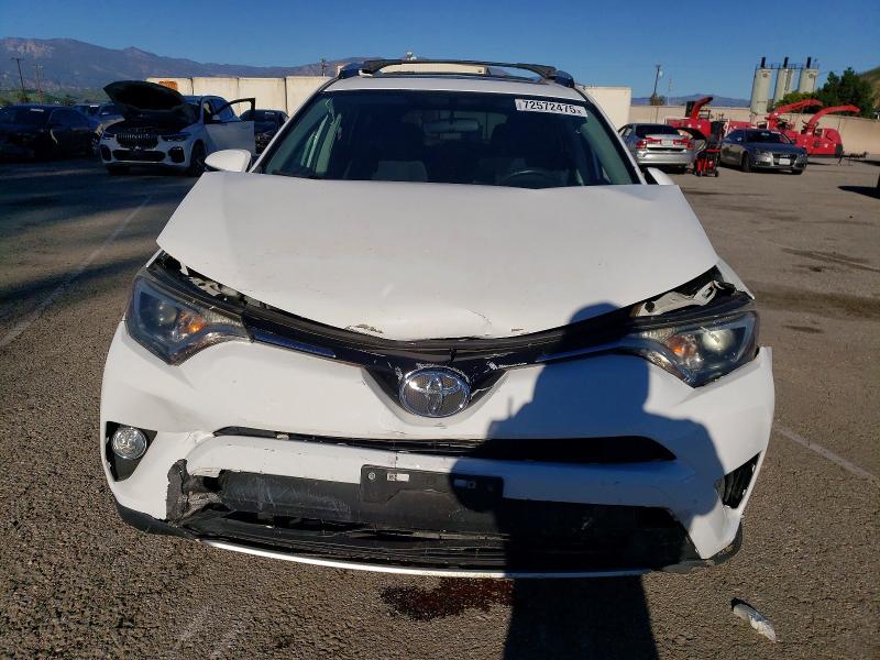 Photo 5 from auction – 2016 TOYOTA RAV4 XLE with VIN 2T3WFREV7GW250603