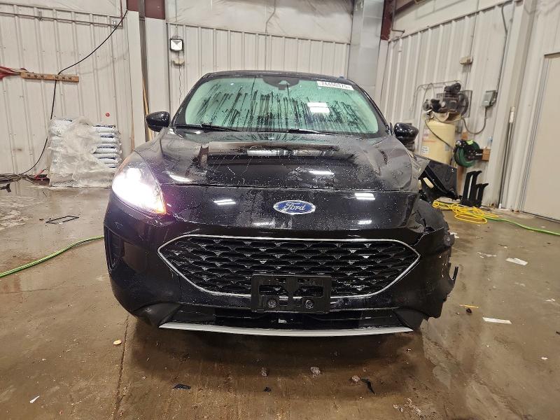 Photo 5 from auction – 2021 FORD ESCAPE SE with VIN 1FMCU9G66MUA19792