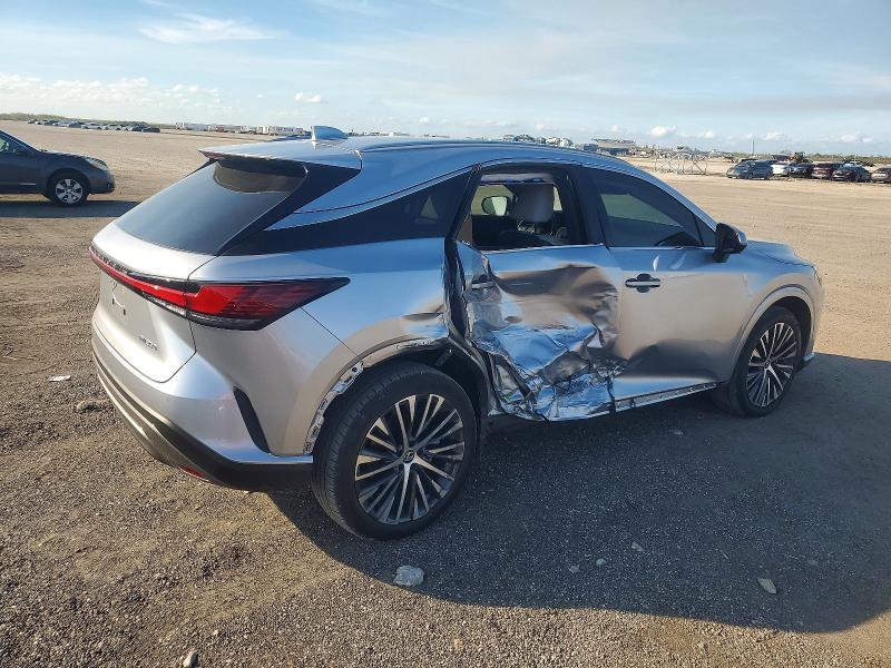 Photo 3 from auction – 2023 LEXUS RX with VIN JTJCHMAA1P2005546