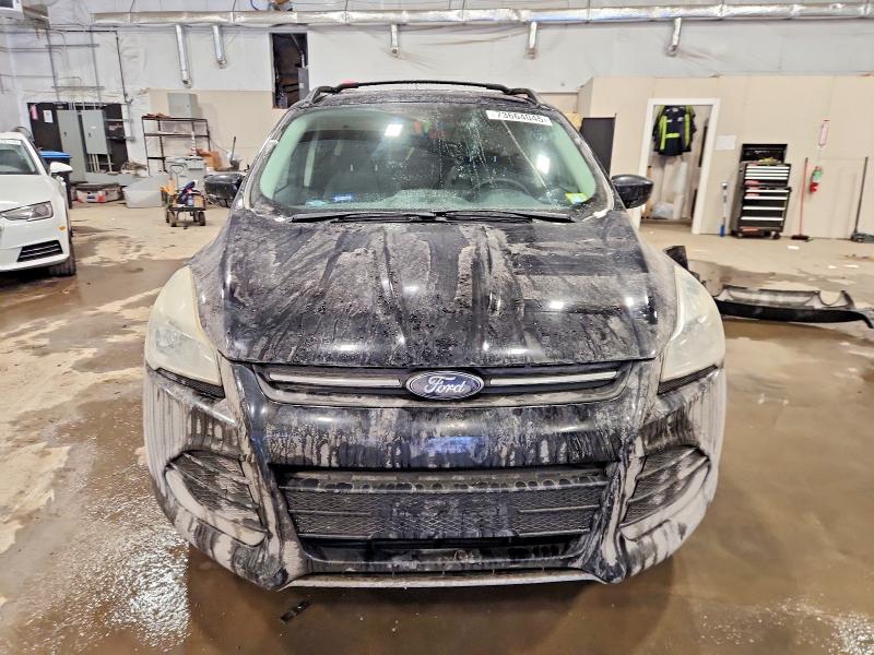 Photo 5 from auction – 2016 FORD ESCAPE with VIN 1FMCU9GX0GUA34625
