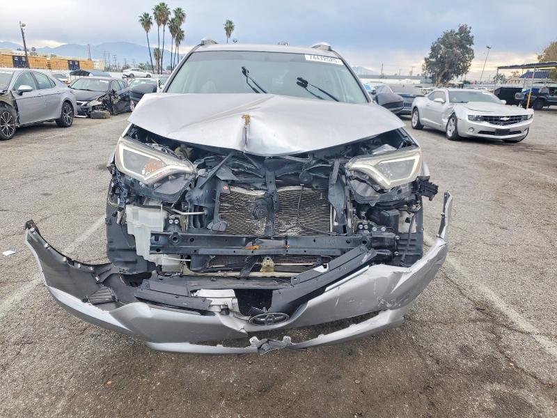 Photo 5 from auction – 2016 TOYOTA RAV4 with VIN 2T3ZFREV5GW259393