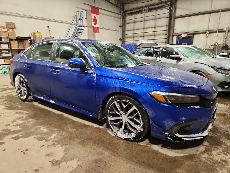 Photo 4 from auction – 2022 HONDA CIVIC with VIN 2HGFE1F93NH000926