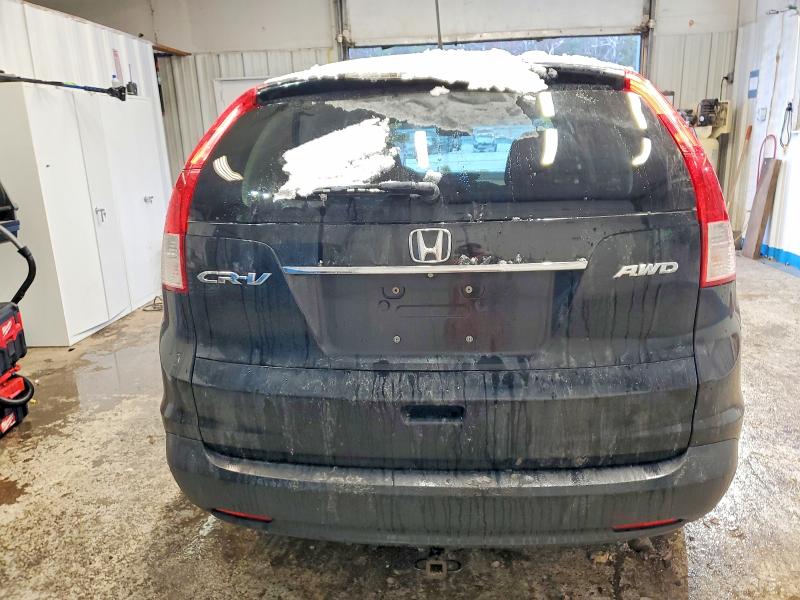Photo 6 from auction – 2013 HONDA CR-V LX with VIN 2HKRM4H34DH669365