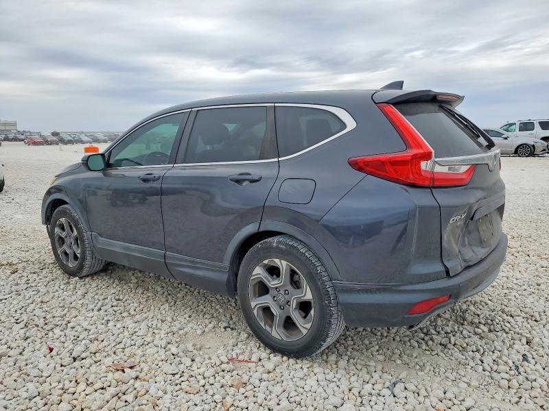 Photo 2 from auction – 2017 HONDA CR-V with VIN 7FARW1H81HE037775