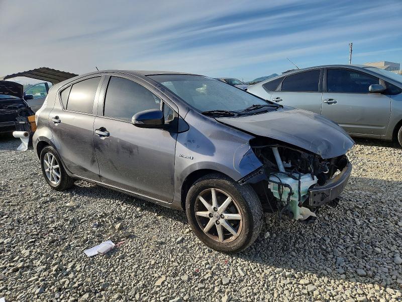 Photo 4 from auction – 2014 TOYOTA PRIUS C with VIN JTDKDTB36E1563044