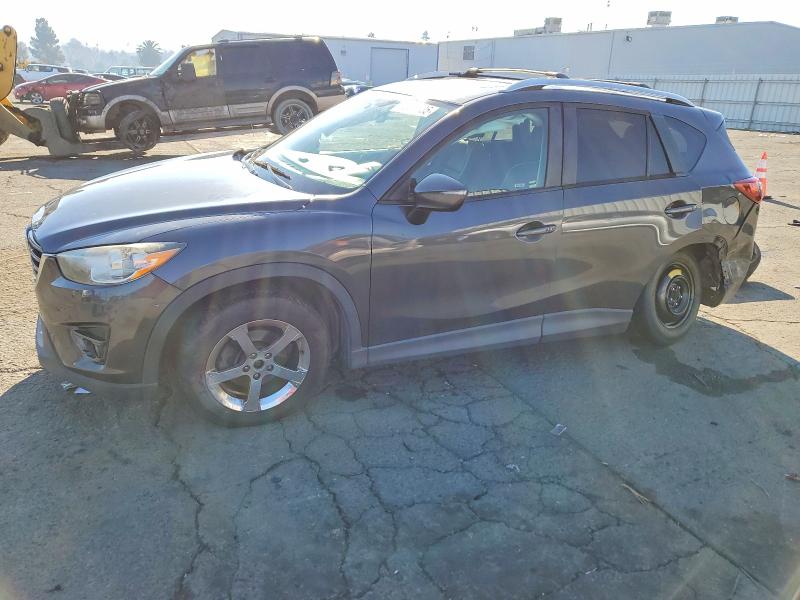 MAZDA CX-5 2016 with VIN JM3KE2DY1G0765113 - Photo from auction