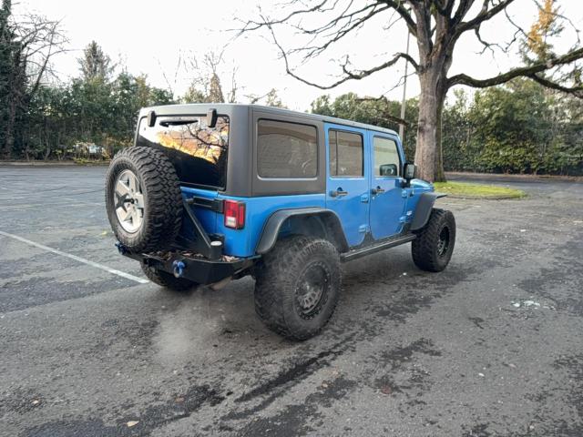Photo 4 from auction – 2014 JEEP WRANGLER U with VIN 1C4BJWEG4EL264715