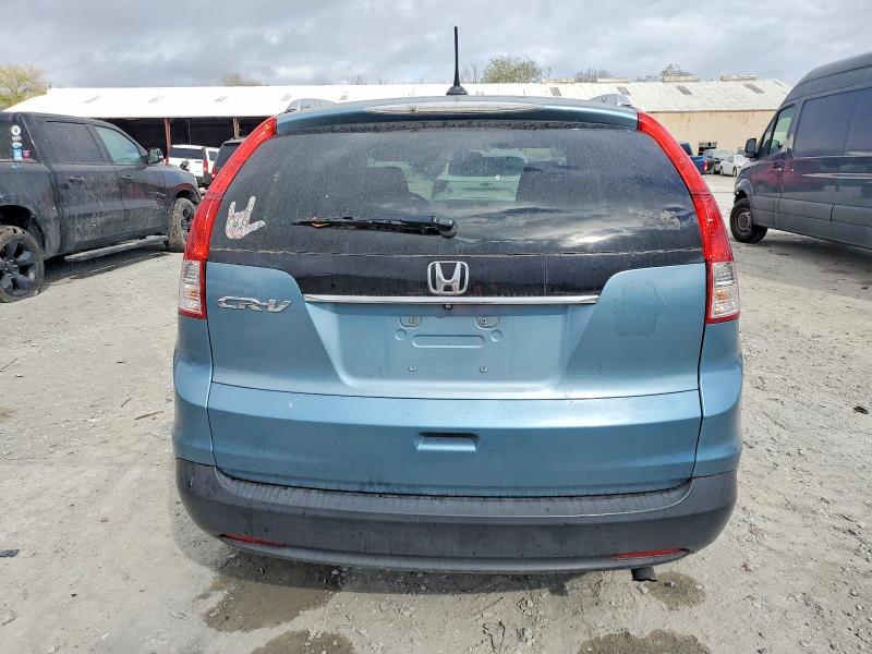 Photo 6 from auction – 2014 HONDA CR-V with VIN 2HKRM3H76EH527923