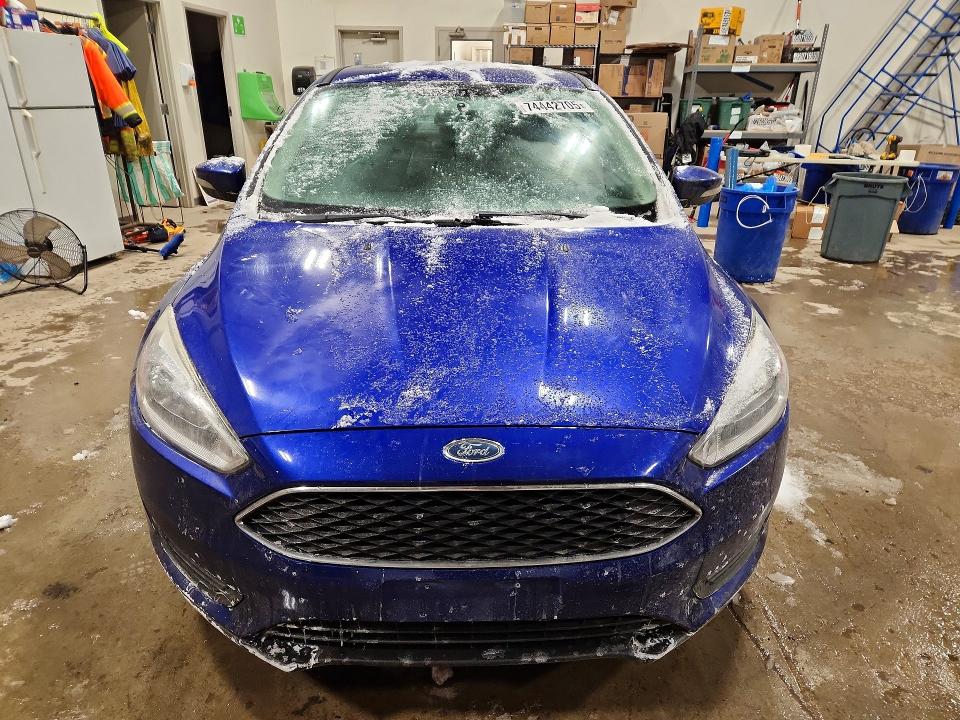 Photo 5 from auction – 2015 FORD FOCUS with VIN 1FADP3J29FL371685