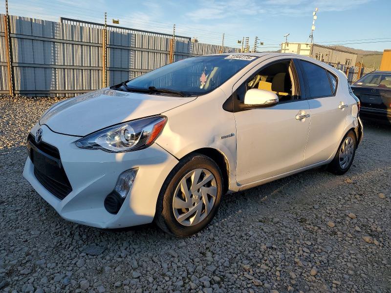 TOYOTA PRIUS C 2015 with VIN JTDKDTB31F1581615 - Photo from auction