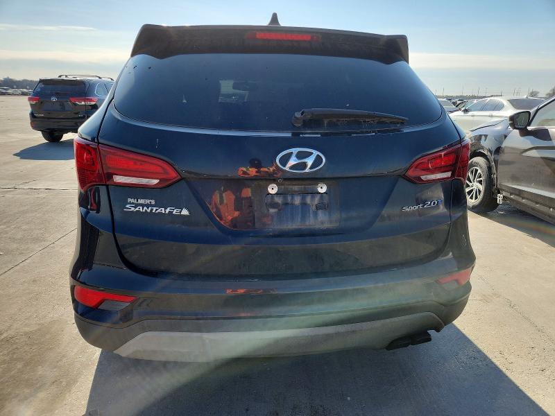 Photo 6 from auction – 2018 HYUNDAI SANTA FE S with VIN 5NMZU4LA6JH096337