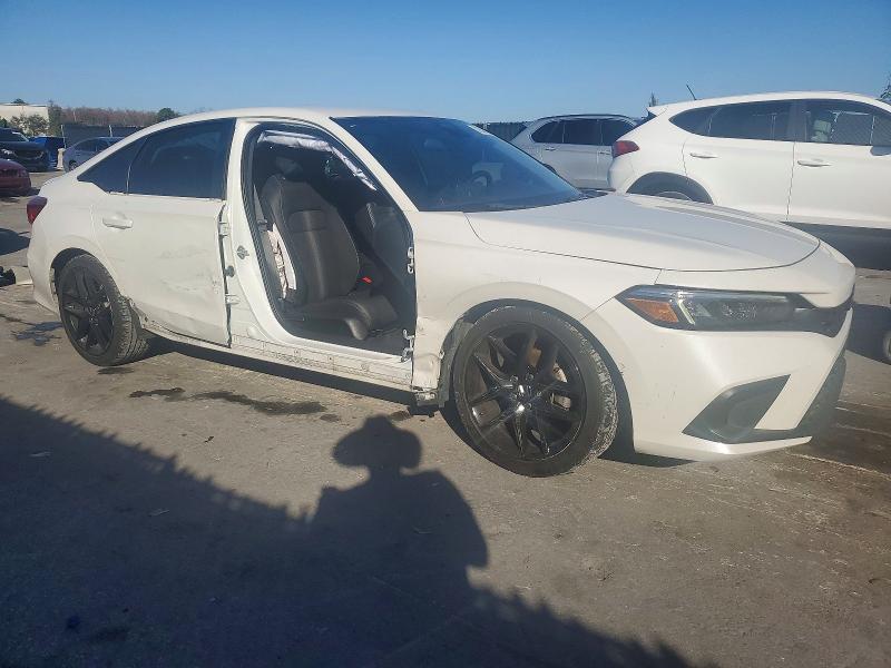 Photo 4 from auction – 2023 HONDA CIVIC SPOR with VIN 2HGFE2F53PH528892