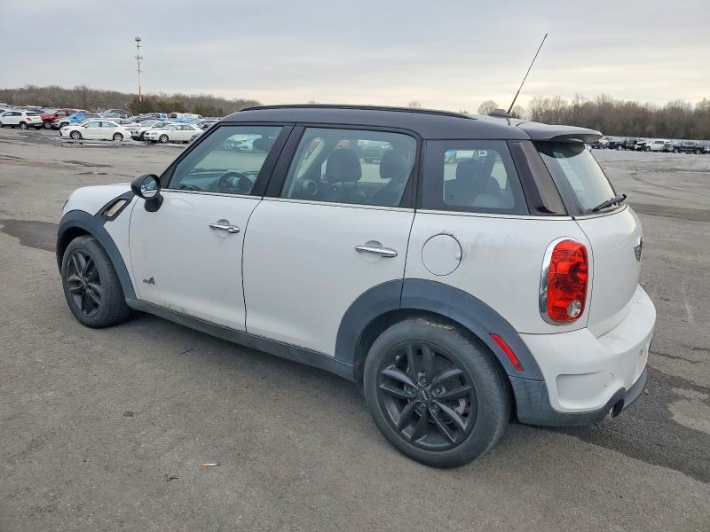 Photo 2 from auction – 2011 MINI COOPER COU with VIN WMWZC5C57CWL61601
