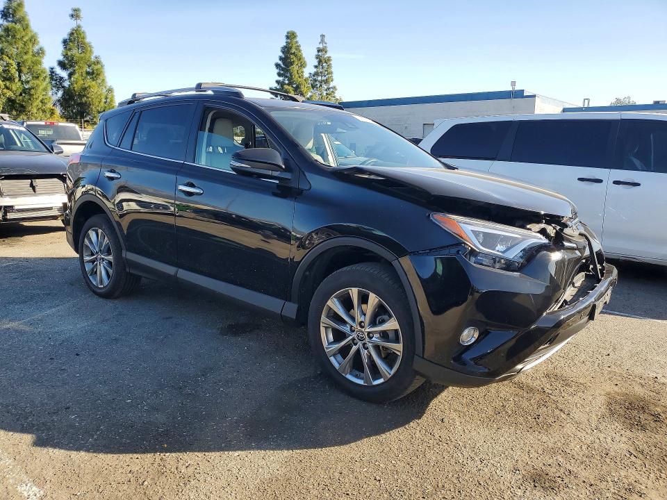 Photo 4 from auction – 2018 TOYOTA RAV4 with VIN 2T3YFREV3JW473687