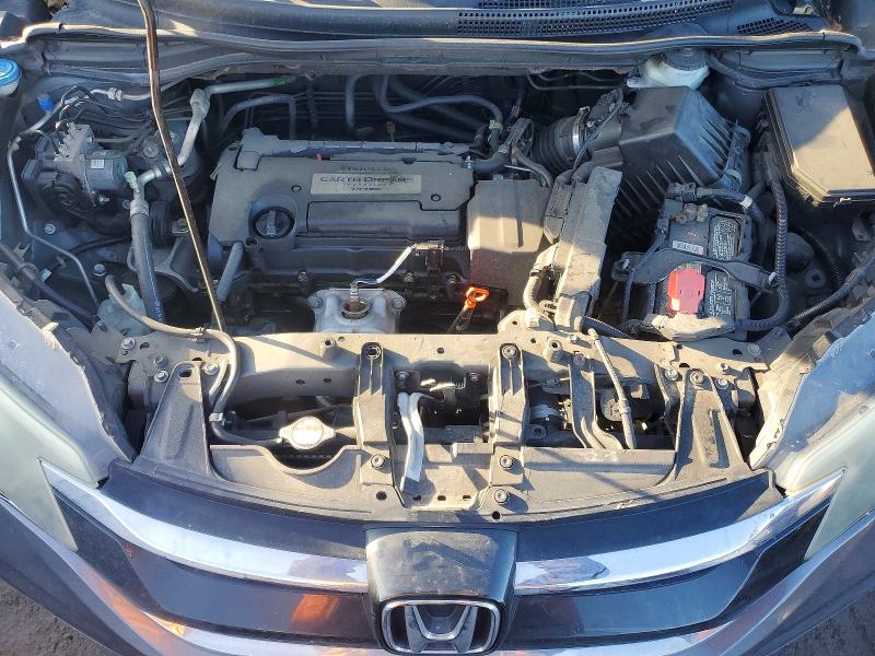 Photo 11 from auction – 2015 HONDA CR-V with VIN 2HKRM3H77FH501798