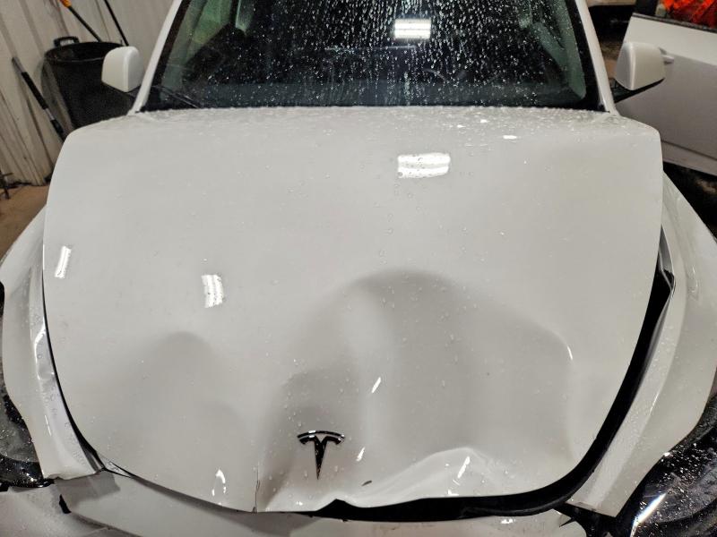Photo 11 from auction – 2022 TESLA MODEL Y with VIN 7SAYGDEE4NF531921