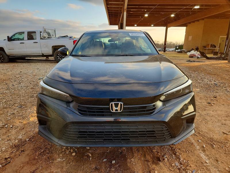 Photo 5 from auction – 2023 HONDA CIVIC SPOR with VIN 2HGFE2F58PH545607