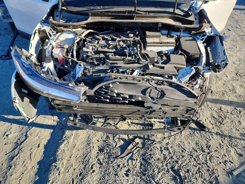 Photo 12 from auction – 2023 TOYOTA COROLLA CROSS with VIN 7MUDAAAG6PV057218