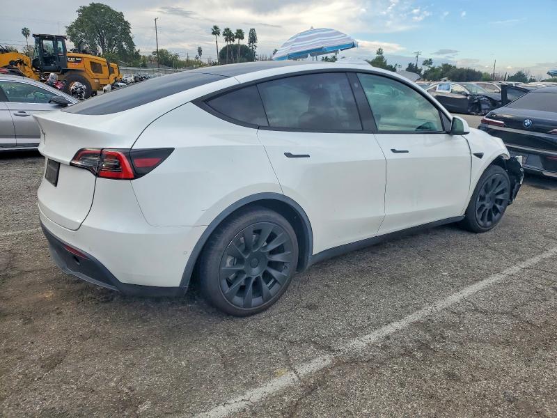 Photo 3 from auction – 2021 TESLA MODEL Y with VIN 5YJYGDED4MF114995