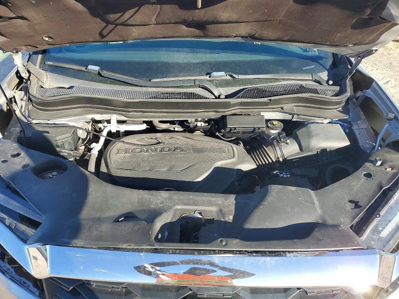 Photo 12 from auction – 2023 HONDA PASSPORT E with VIN 5FNYF8H58PB012814