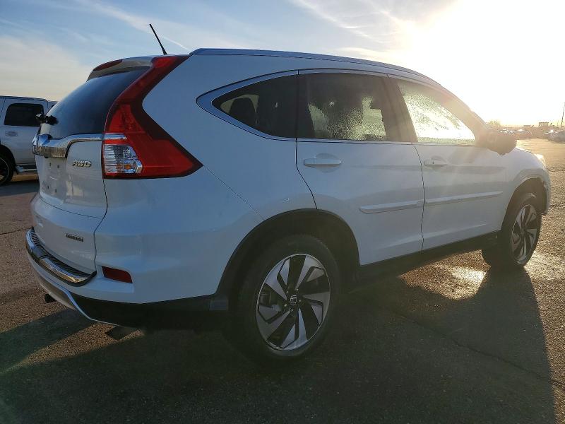 Photo 3 from auction – 2015 HONDA CR-V TOURI with VIN 5J6RM4H98FL096399