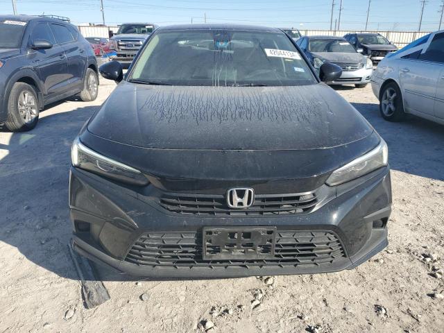 Photo 5 from auction – 2023 HONDA CIVIC EX with VIN 2HGFE1F74PH301447