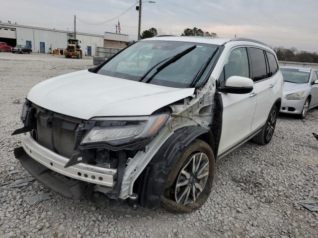 HONDA PILOT TOUR 2021 with VIN 5FNYF5H69MB013313 - Photo from auction