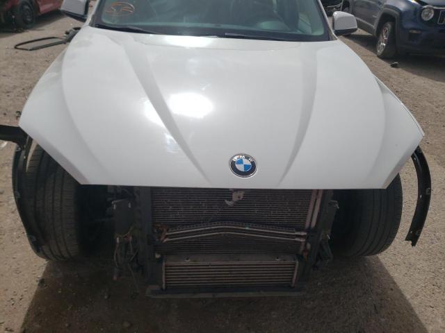Photo 11 from auction – 2014 BMW X1 XDRIVE2 with VIN WBAVL1C59EVY18585