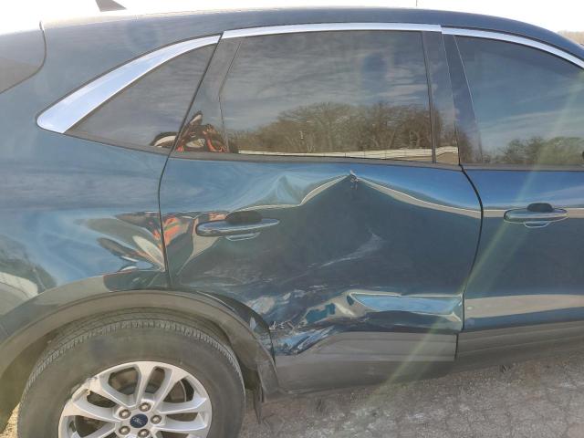 Photo 11 from auction – 2020 FORD ESCAPE SE with VIN 1FMCU9G67LUB01027