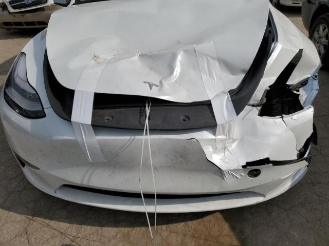 Photo 11 from auction – 2023 TESLA MODEL Y with VIN 7SAYGDEE2PA119609