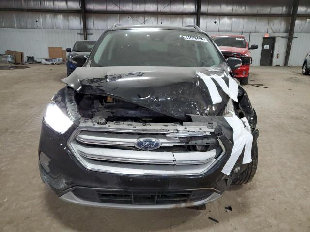 Photo 5 from auction – 2018 FORD ESCAPE TIT with VIN 1FMCU9J95JUA03226