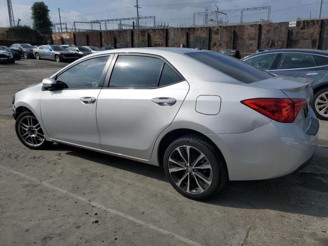 Photo 2 from auction – 2017 TOYOTA COROLLA L with VIN 5YFBURHE1HP697021