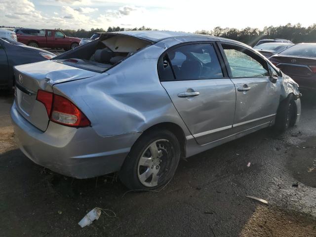 Photo 3 from auction – 2011 HONDA CIVIC LX with VIN 19XFA1F56BE029352