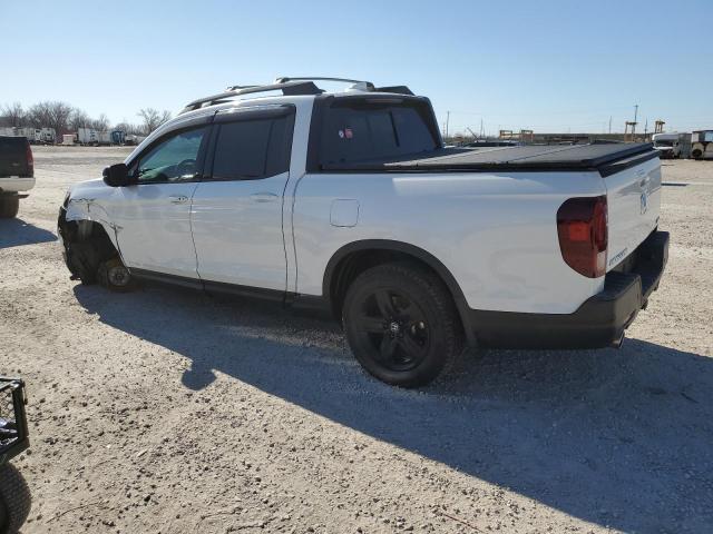 Photo 2 from auction – 2023 HONDA RIDGELINE with VIN 5FPYK3F84PB021111