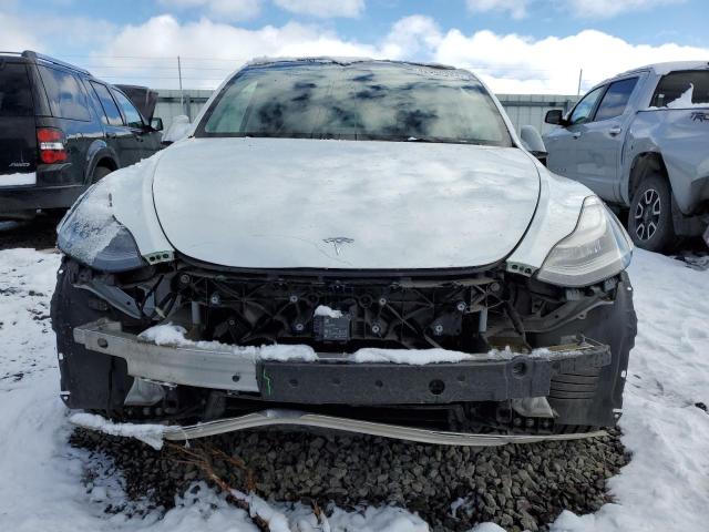 Photo 5 from auction – 2021 TESLA MODEL Y with VIN 5YJYGDED6MF103724