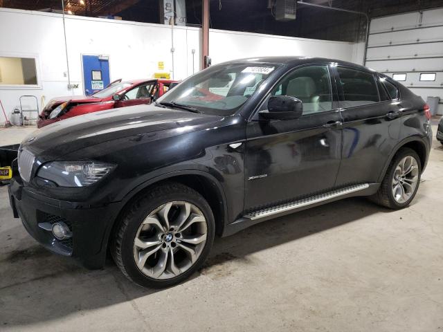 BMW X6 XDRIVE5 2011 with VIN 5UXFG8C55BLZ96522 - Photo from auction