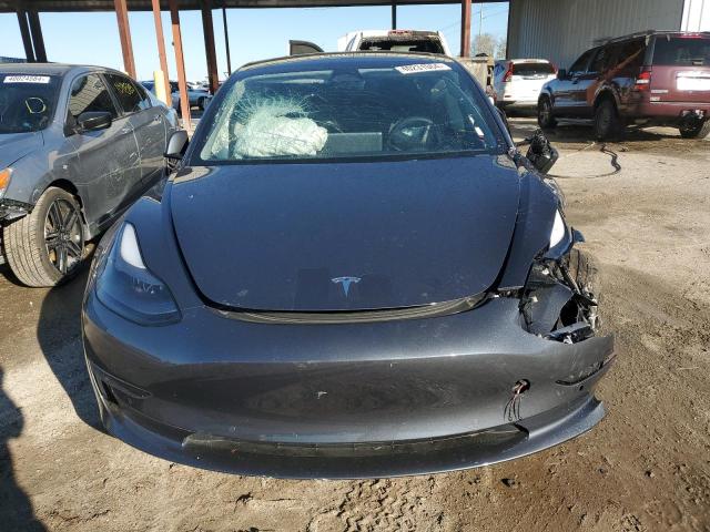 Photo 5 from auction – 2022 TESLA MODEL 3 with VIN 5YJ3E1EB3NF335681