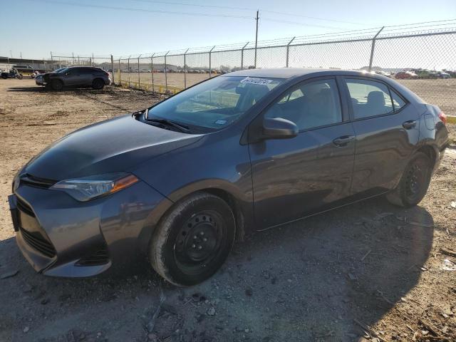 TOYOTA COROLLA L 2017 with VIN 5YFBURHE3HP719052 - Photo from auction