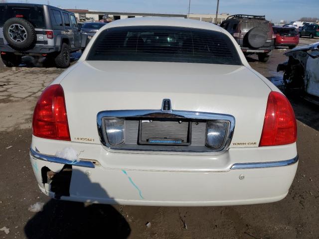 Photo 6 from auction – 2004 LINCOLN TOWN CAR U with VIN 1LNHM83W24Y640056
