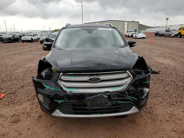 Photo 5 from auction – 2019 FORD ESCAPE TIT with VIN 1FMCU9J97KUB11977
