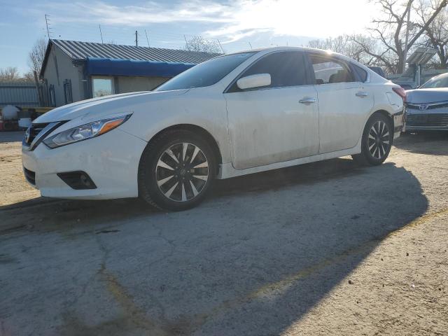NISSAN ALTIMA 2.5 2018 with VIN 1N4AL3AP5JC176685 - Photo from auction