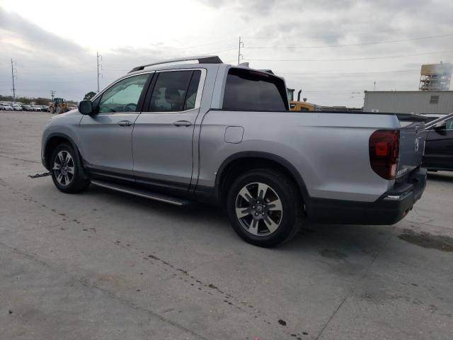 Photo 2 from auction – 2018 HONDA RIDGELINE with VIN 5FPYK2F57JB001054