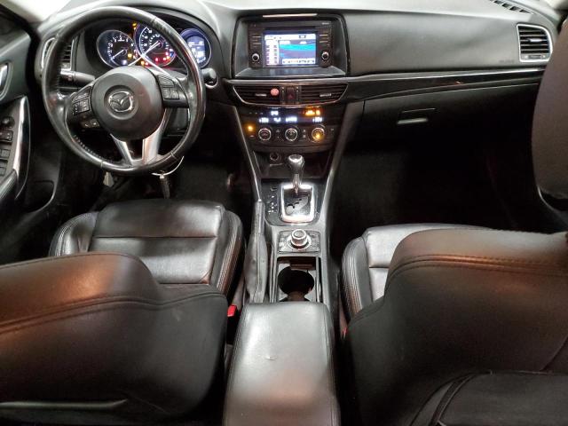 Photo 8 from auction – 2014 MAZDA 6 TOURING with VIN JM1GJ1V6XE1119285