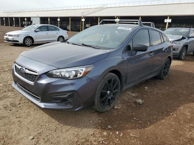 SUBARU IMPREZA 2017 with VIN 4S3GTAA64H1732488 - Photo from auction