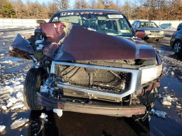 Photo 5 from auction – 2011 HONDA RIDGELINE with VIN 5FPYK1F55BB004577